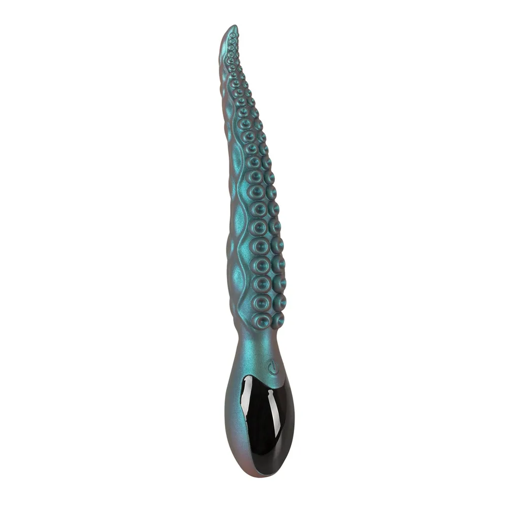 Beasty Cocks Octo Vibes i turkos metallic, sedd snett framifrån med sugkoppsstrukturen och det svarta handtaget