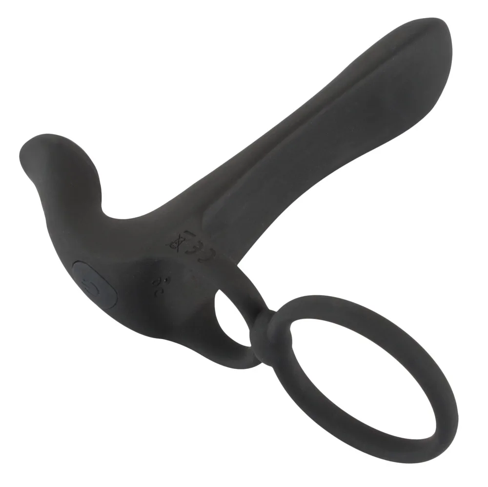 Black Velvets Couples Vibrator i svart silikon, sedd snett framifrån med skaftet, penisringen och pungringen