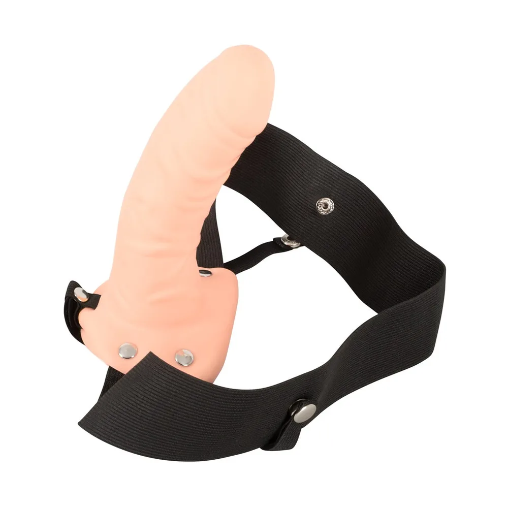 Fetish Fantasy Beginner's Hollow Strap-On i ljus hudton med svart elastisk sele, sedd snett framifrån