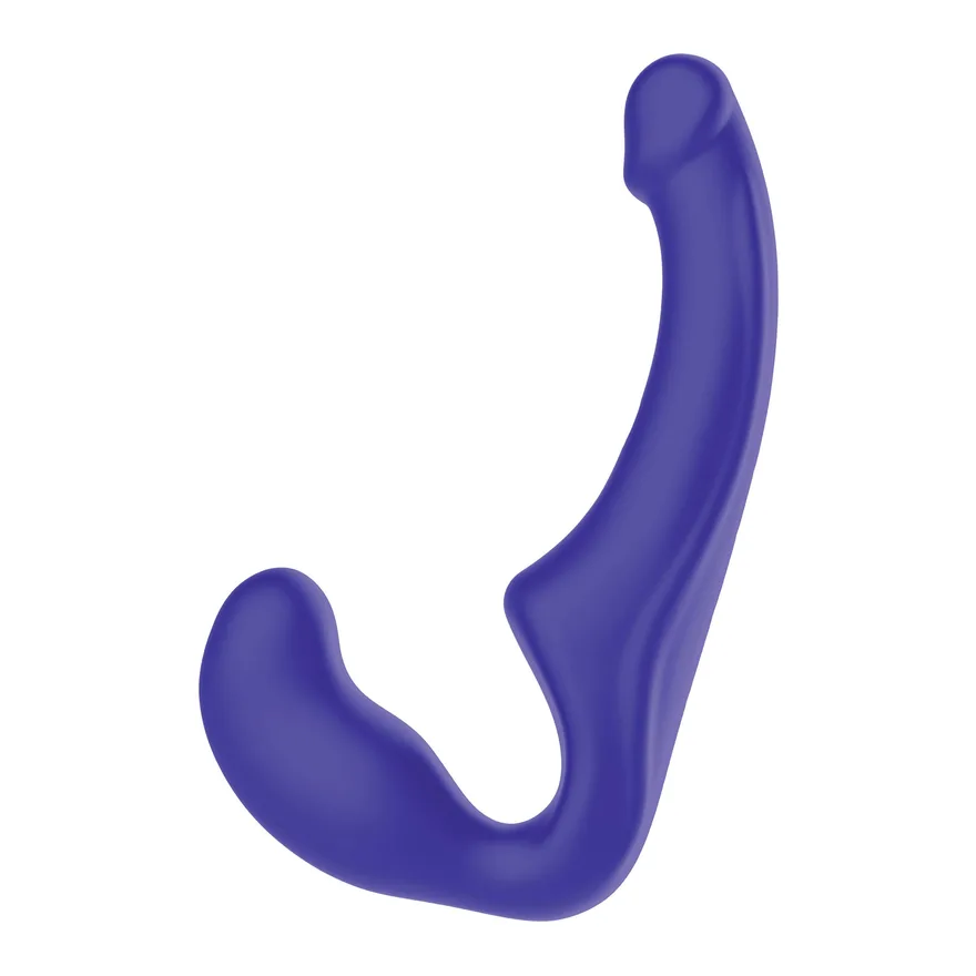 Get-Real Toyjoy Strapon Strapless i lila silikon, sedd snett från sidan med insättningsdelen nedtill och skaftet uppåt
