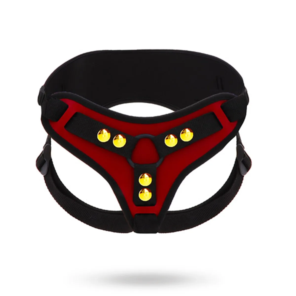 Taboom Strap-On Harness Deluxe i rött och svart, fotograferad rakt framifrån mot vit bakgrund med den breda ryggdelen uppåt och guldfärgade nitar på frontpartiet